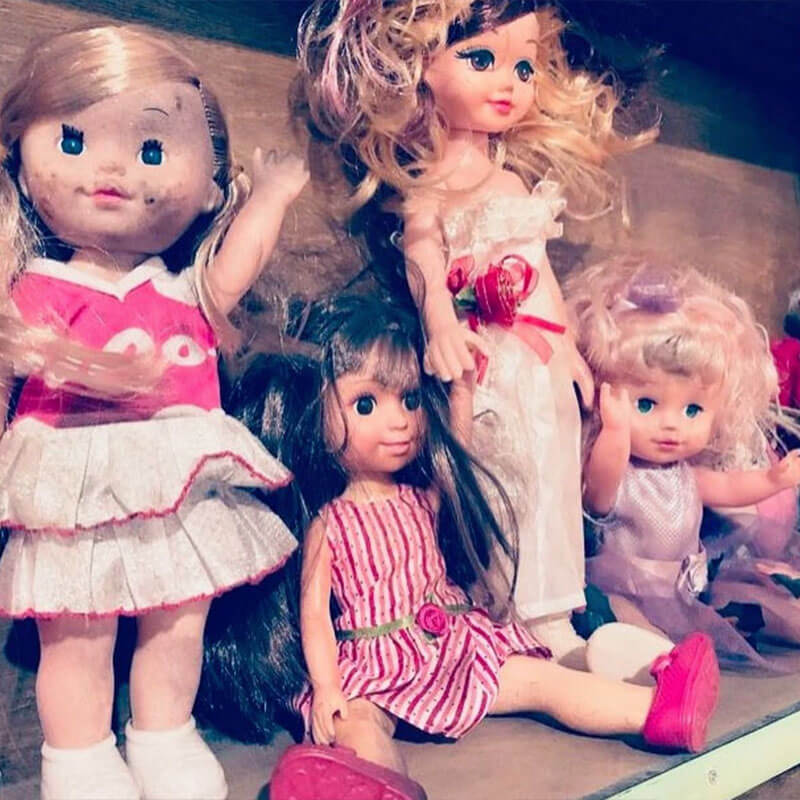 girl dolls on a shelf 1